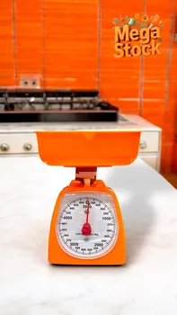 משקל מטבח מכני בצבע כתום